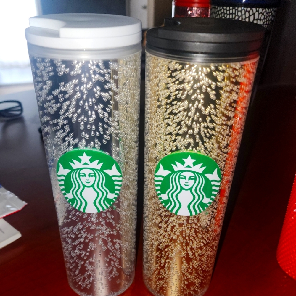 2 plastic coffee travelers